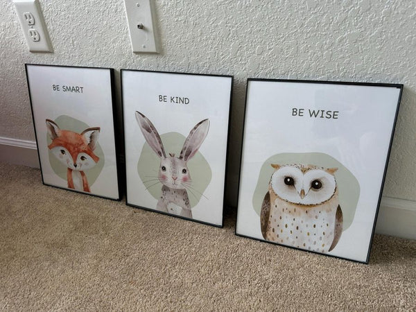 Be Smart fox, Be Kind bunny, and Be Wise owl woodland prints framed in black for a nursery